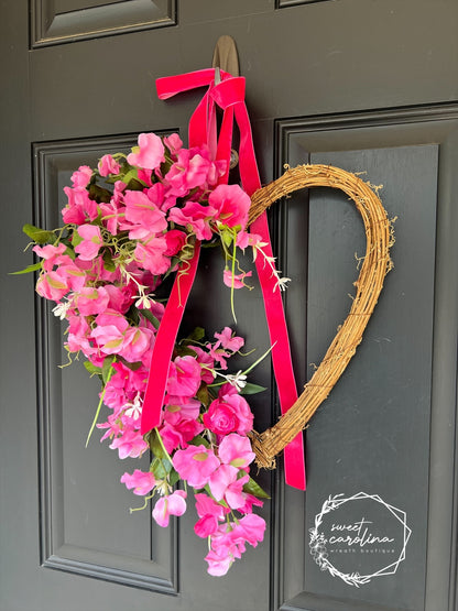 Hot Pink Sweet Pea and Ranunculus Draped Heart Vine Wreath with Velvet Bow