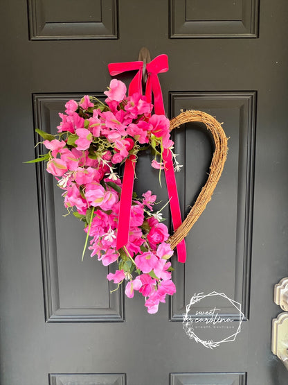 Hot Pink Sweet Pea and Ranunculus Draped Heart Vine Wreath with Velvet Bow