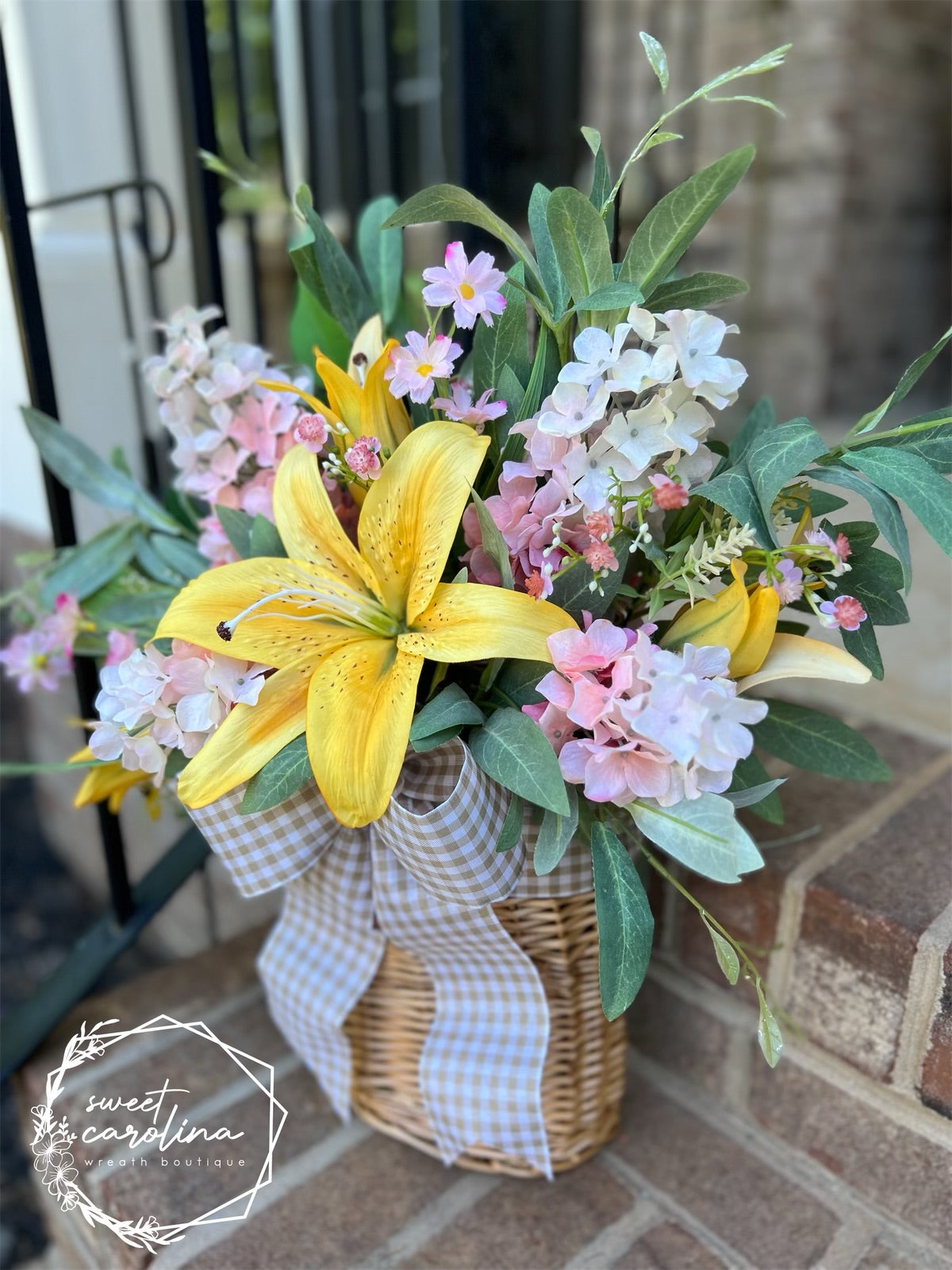 Lily and Cone Hydrangea Basket with Olive Leaves