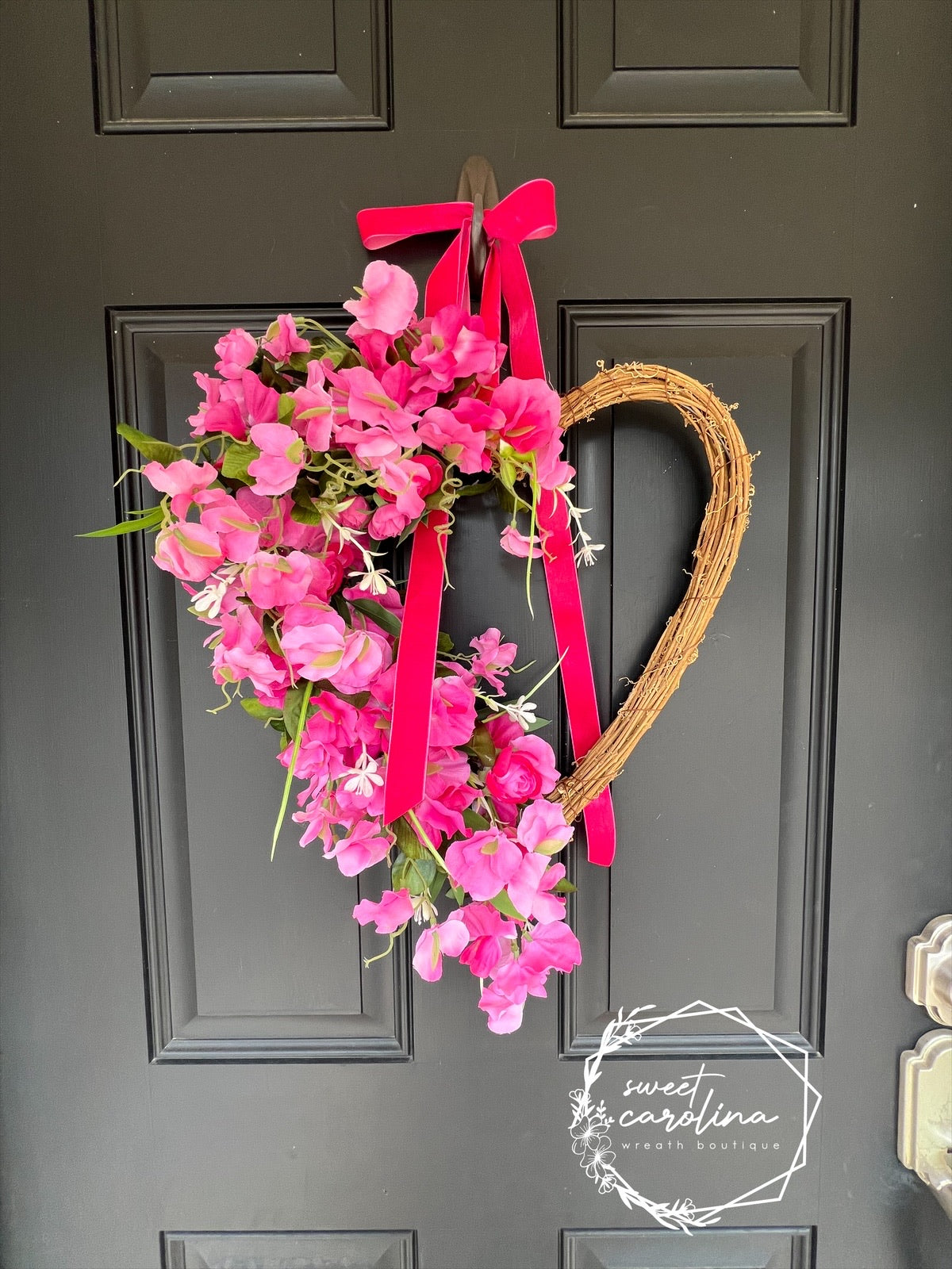 Hot Pink Sweet Pea and Ranunculus Draped Heart Vine Wreath with Velvet Bow